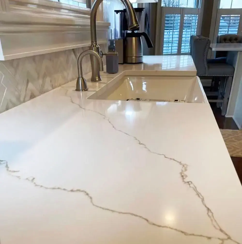 Calacatta Laza Waterfall island And Countertops